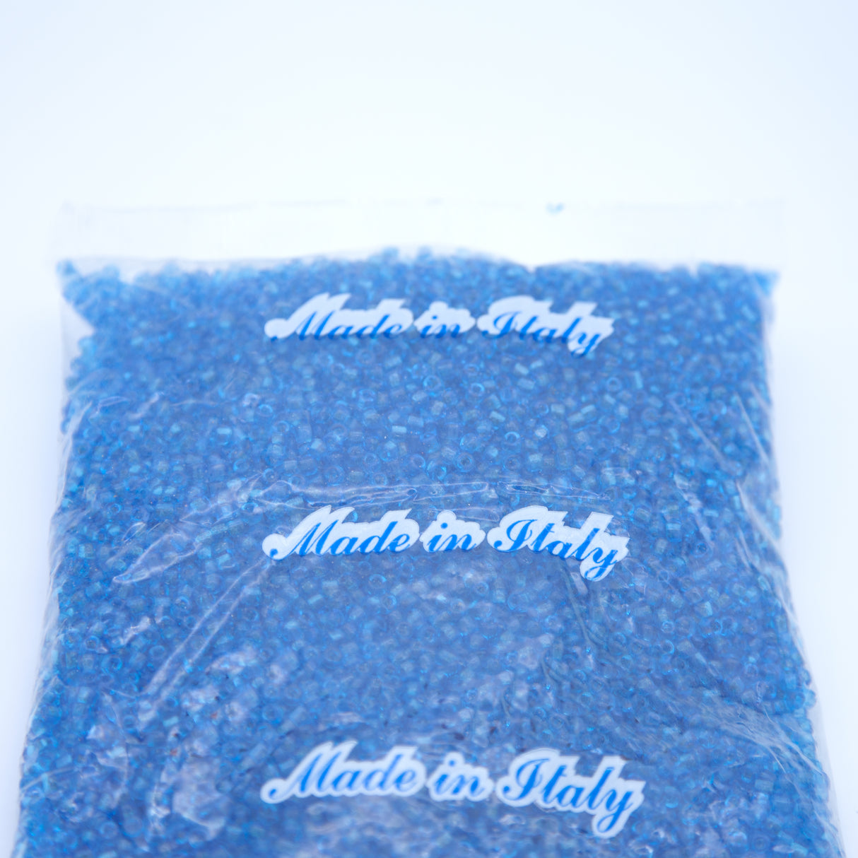 5SV100-48: Vintage Venetian Seed Bead Transparent Aqua 5/0 - 250 Grams