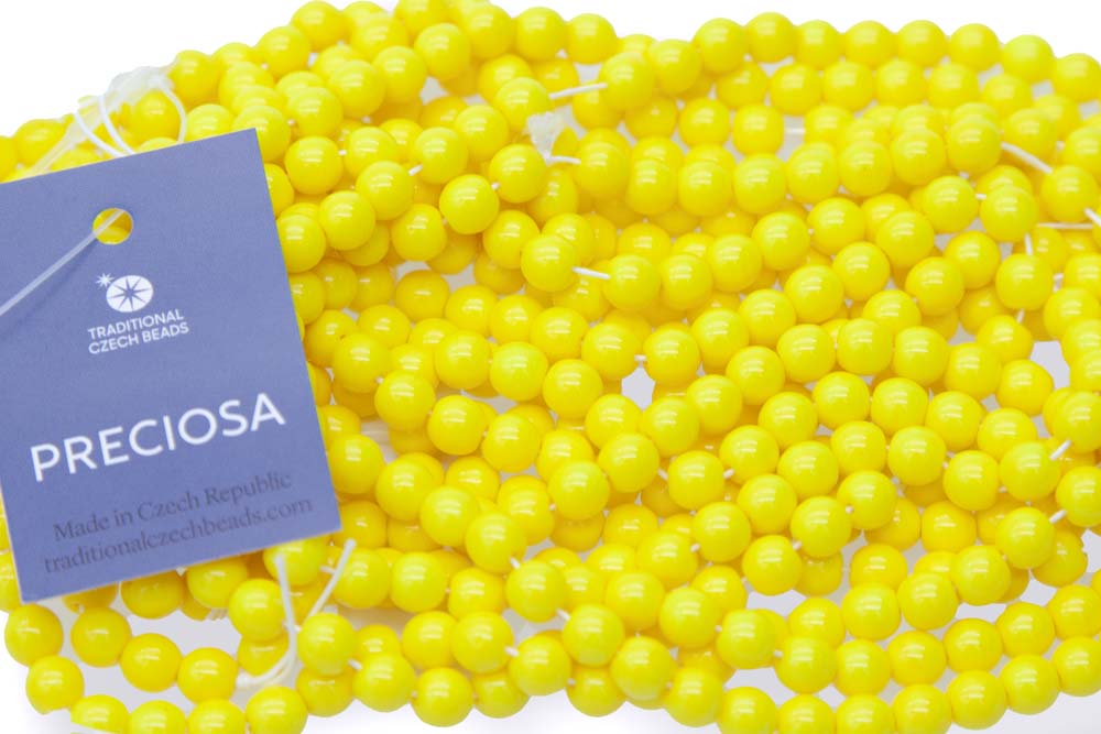 6RD122R: CZ Round Opaque Lemon Yellow 6mm - 50 Pc