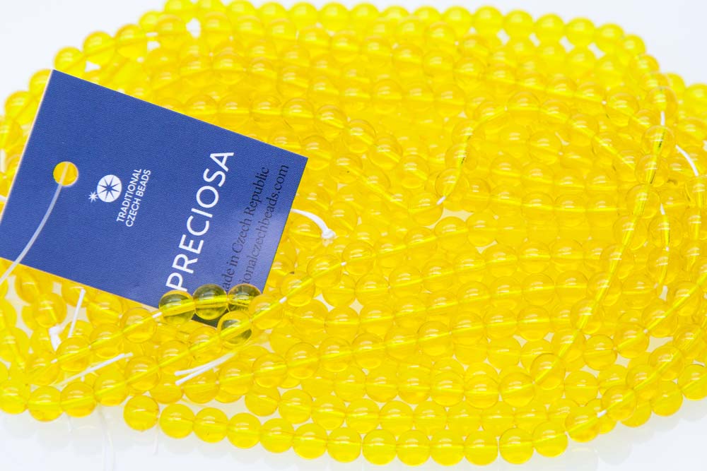 6RD225: CZ Round Transparent Yellow 6mm - 600 Pc