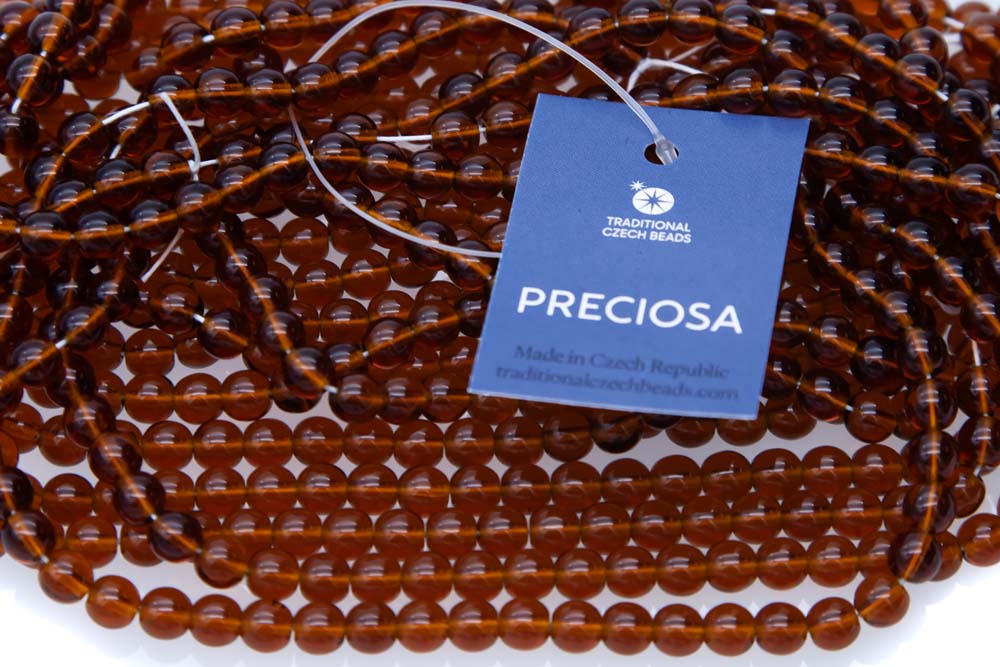 6RD256R: CZ Round Topaz 6mm - 50 Pc