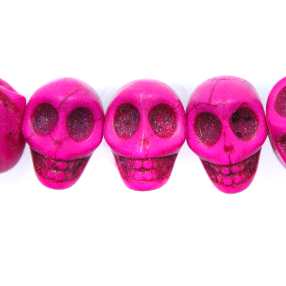 6ST50-P: 14x10mm Pink Magnesite Skull Beads 15.5"