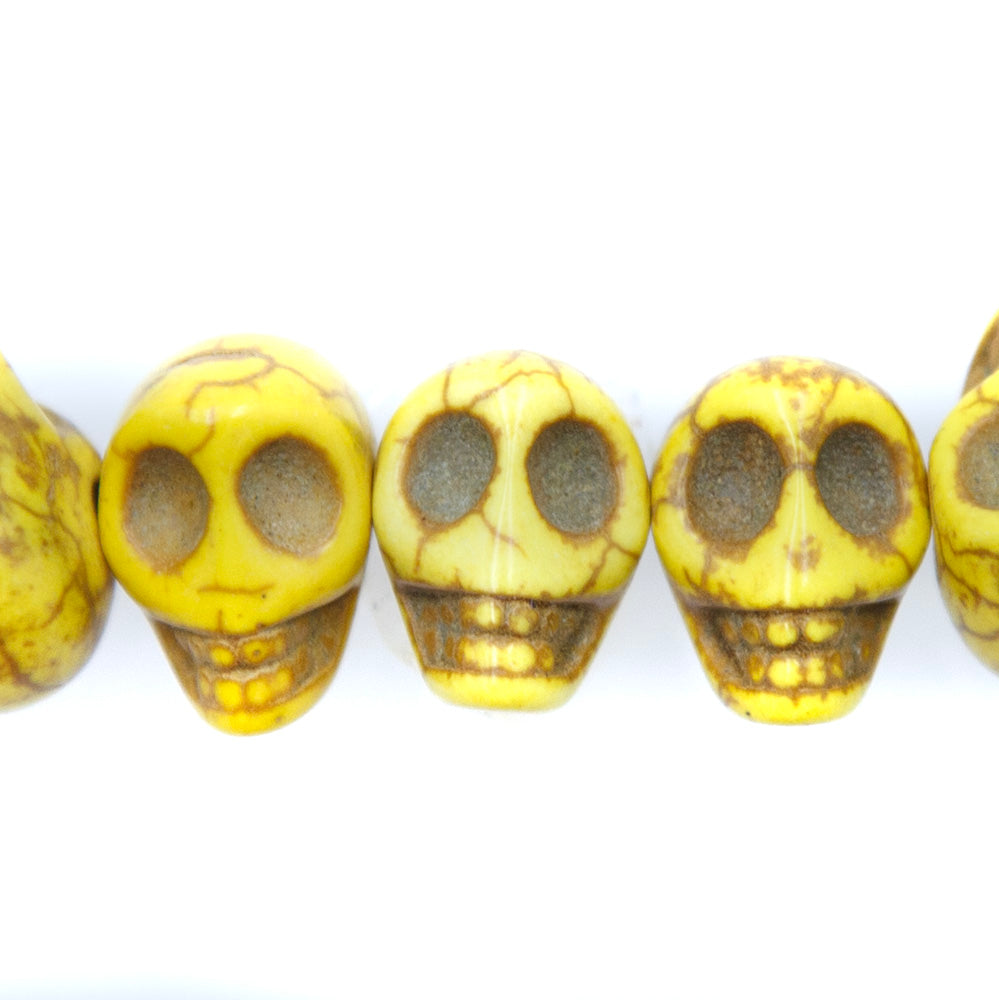 6ST50-Y: 14x10mm Yellow Magnesite Skull Beads 15.5"