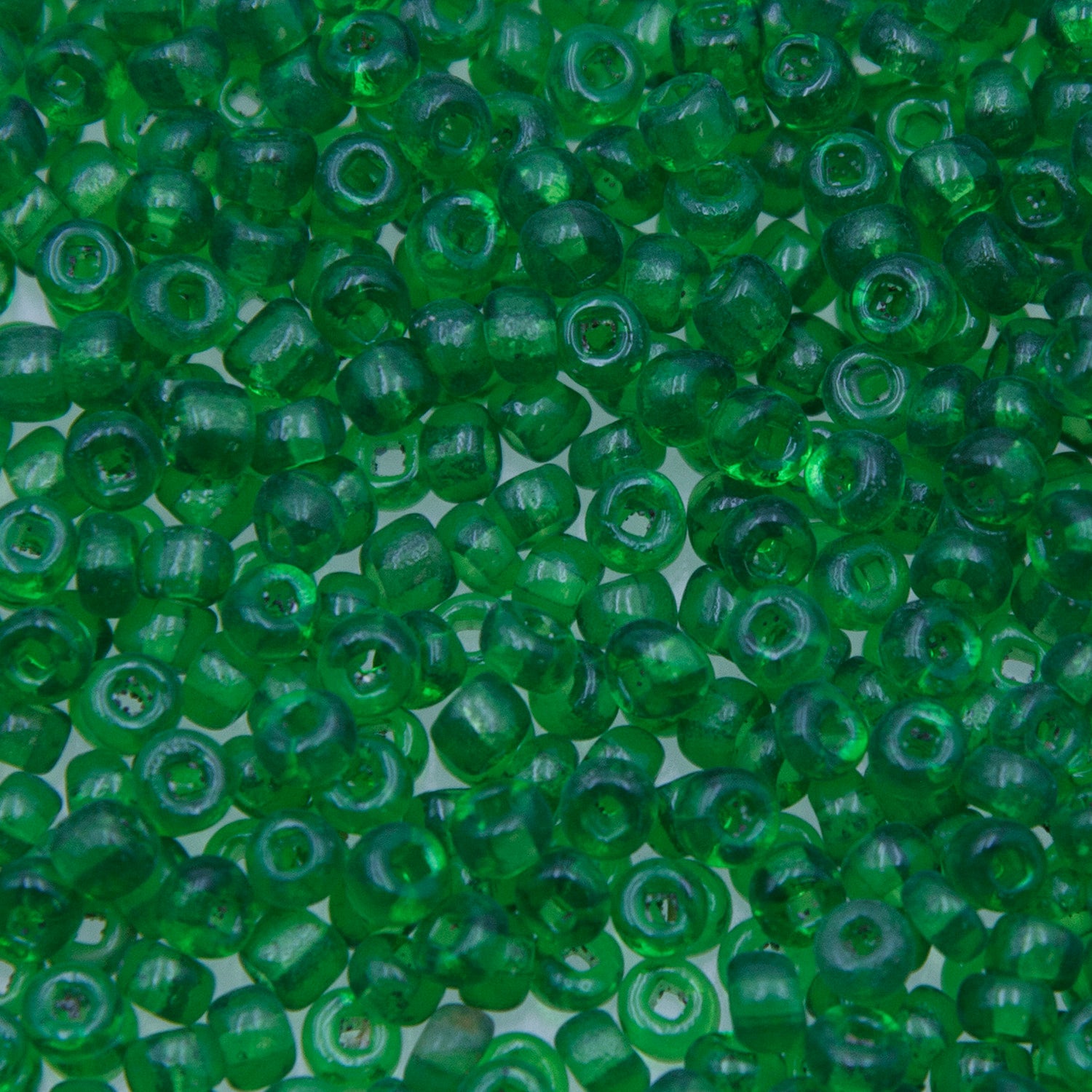 6SV100-24: Vintage Venetian Seed Bead Sq-H Tr Dark Green 6/0