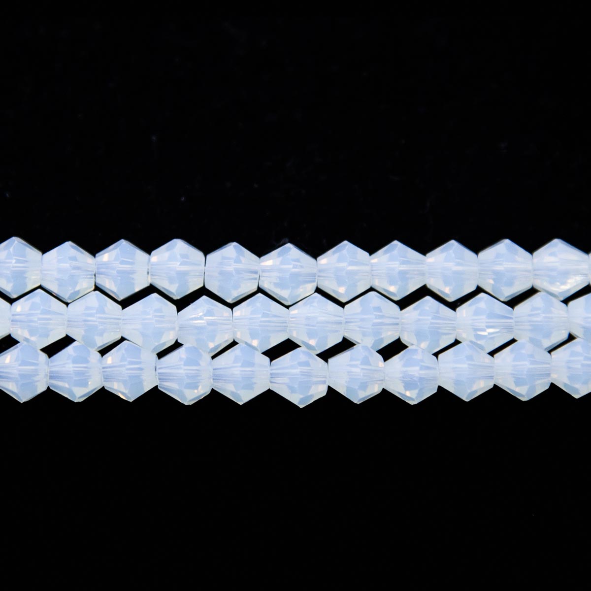 86CG210: 6mm Opalite Faceted Bicone