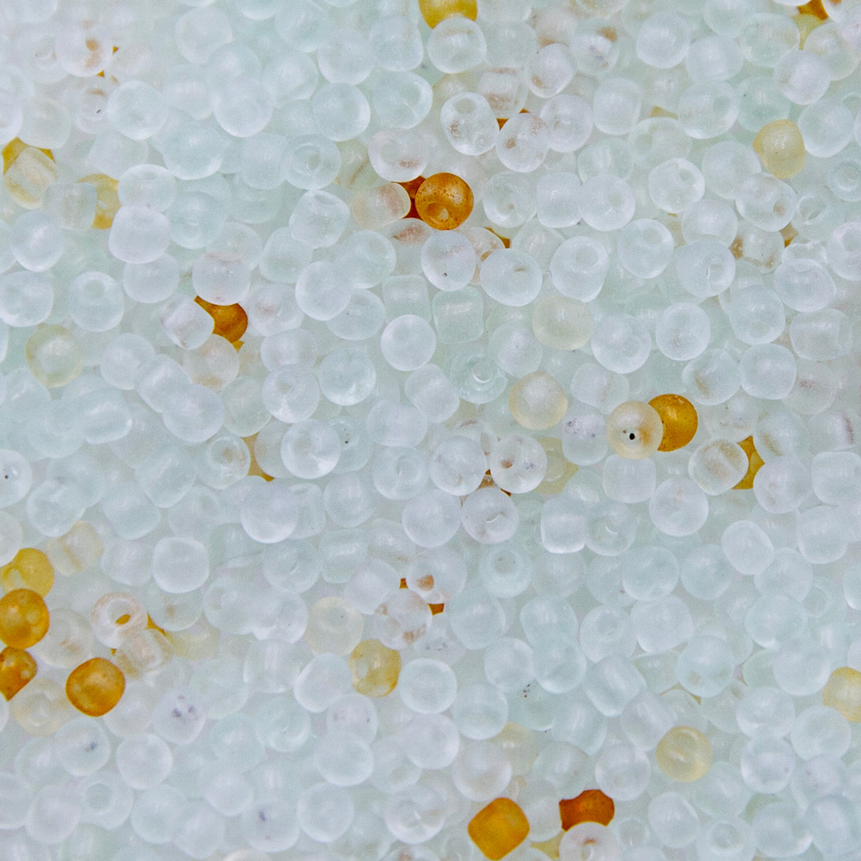 8SV100-34: Vintage Venetian Seed Bead Tr Crystal Green Tint 8/0