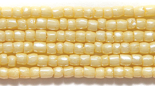 9SC6121: CZ Seed Bead 3-cut Solgel Creamy Butter 9/0 5HK