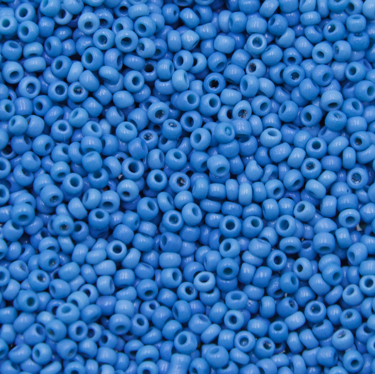 9SV100-50: Vintage Venetian Seed Bead Op Medium Baby Blue Mix 9/0