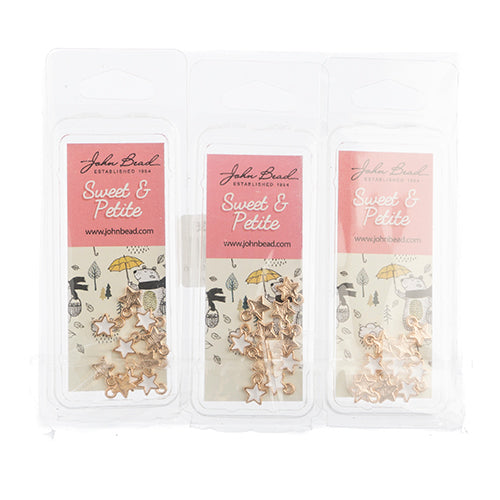 DZ0464-35: Zinc Charm 7x9mm Tiny Star White 10PPK