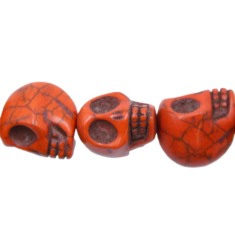 ST50-O: 18x13mm Orange Magnesite Skull Beads 15.5"