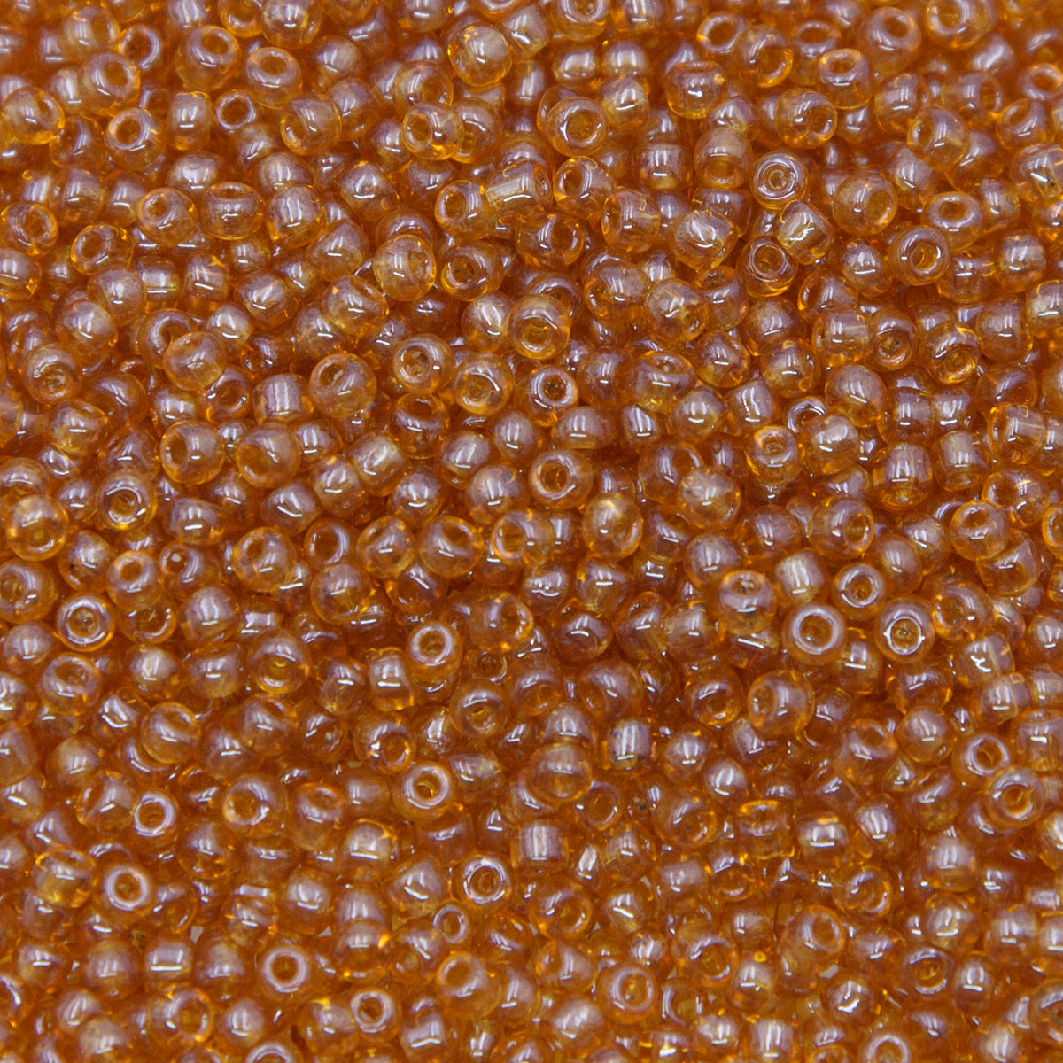 SV100-109: Vintage Venetian Seed Bead Raw Sienna Trans Luster 10/0 - 250 Grams