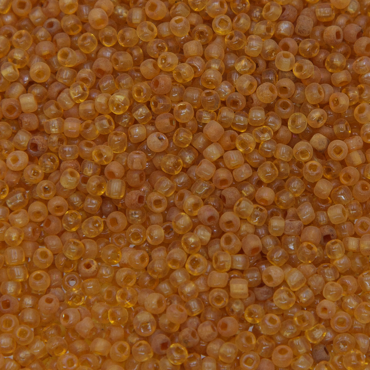 SV100-136: Vintage Venetian Seed Bead Trans Light Topaz 10/0 - 250 Grams