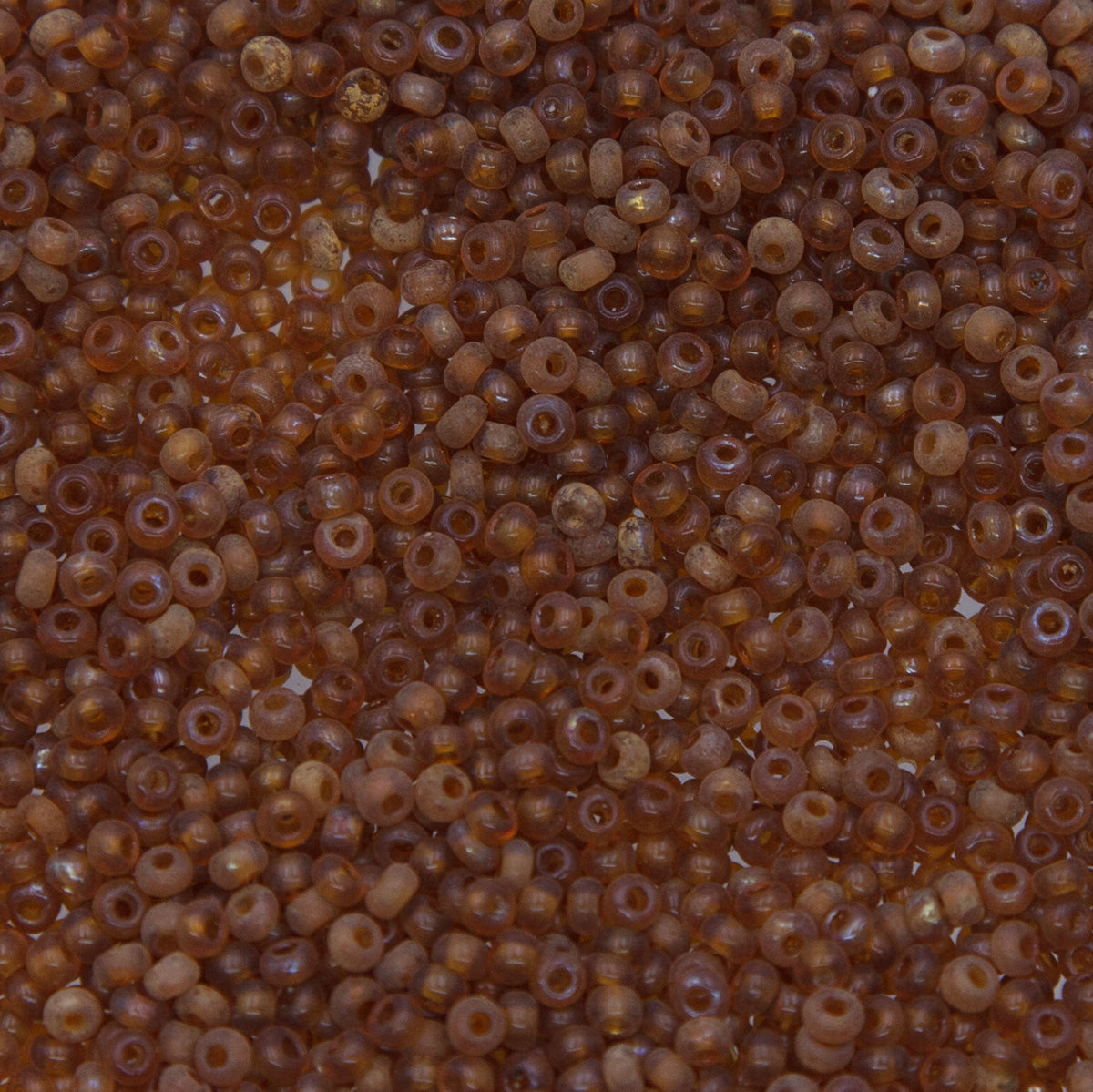 SV100-137: Vintage Venetian Seed Bead Transparent Topaz 10/0 - 250 Grams