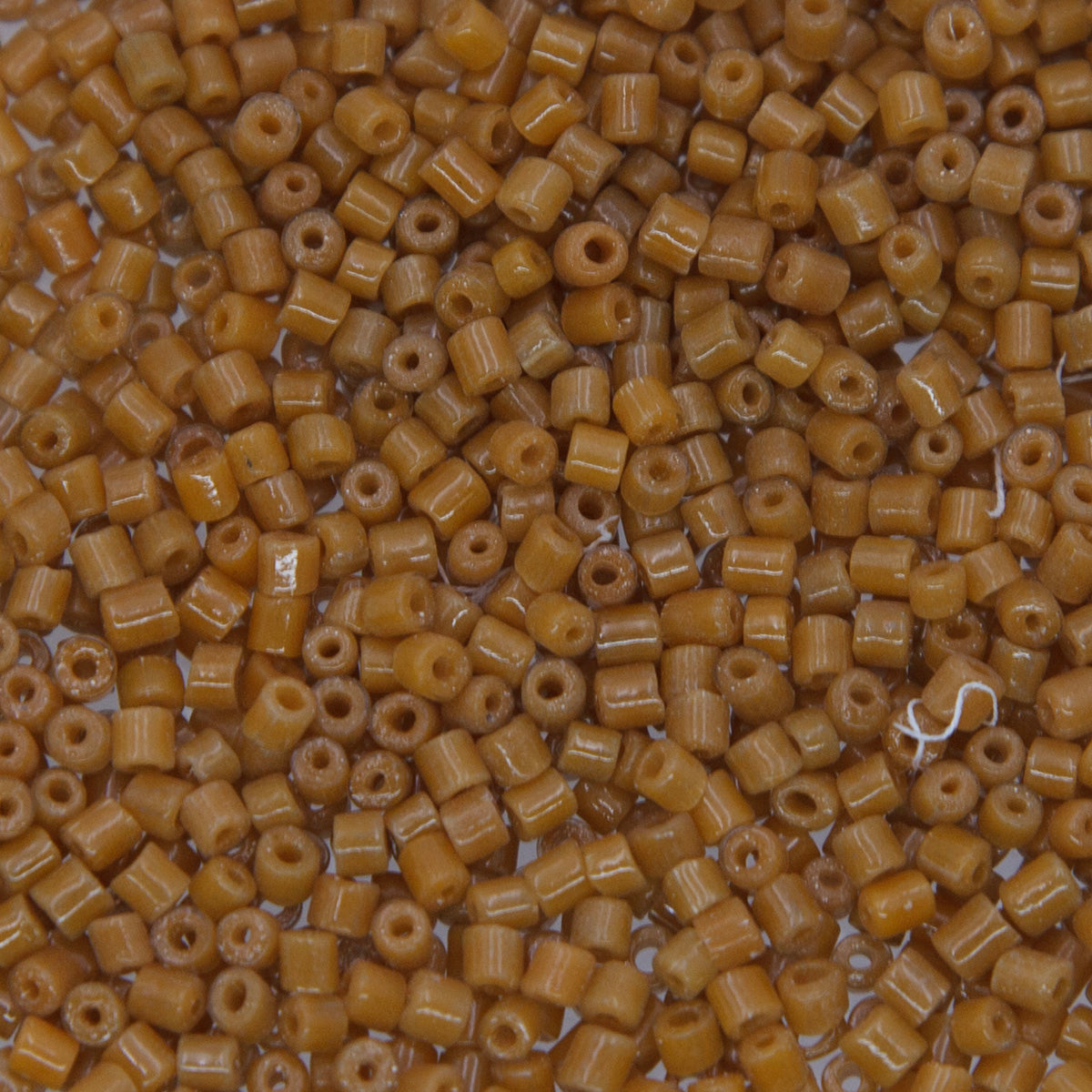 SV100-62: Vintage Venetian Bugle Raw Sienna 2MM AVG - 250 Grams
