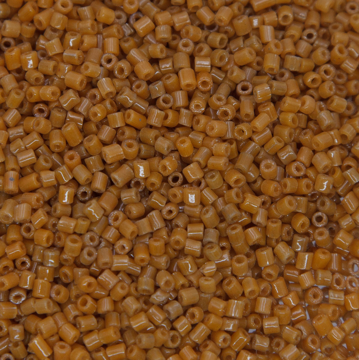 SV100-63: Vintage Venetian Bugle Dark Sienna 2MM AVG - 250 Grams