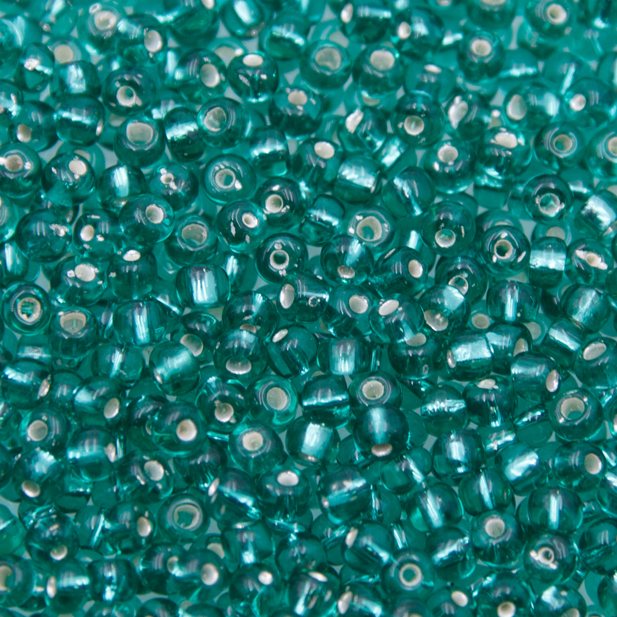 SV100-94: Vintage Venetian Seed Bead Silverlined Emerald 5/0 - 250 Grams
