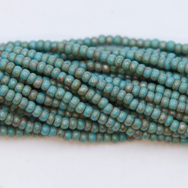 10SB165-52R: CZ Seed Bead Turquoise Blue Travertine Stone 10/0-1HK