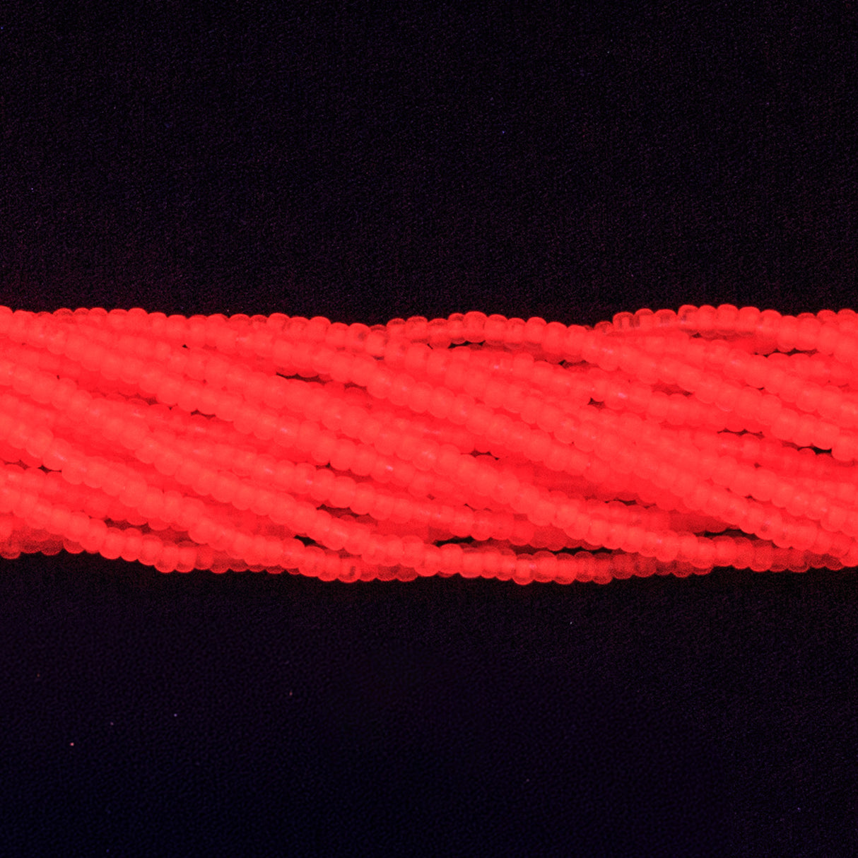 10SB638-NT: CZ Seed Bead Neon Orange On Crystal 10/0 5HK