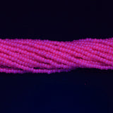 10SB692-DYR: CZ Seed Bead Dyed Pink On Alabaster 10/0-1HK