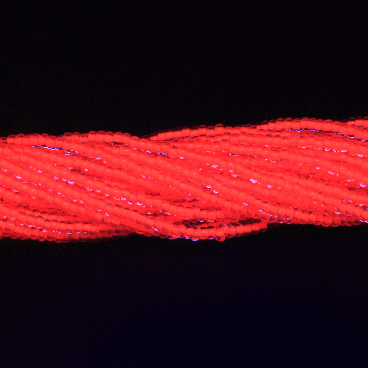 10SB734-NR: CZ Seed Bead Neon Lined Orange 10/0 Uv Reactive-1HK