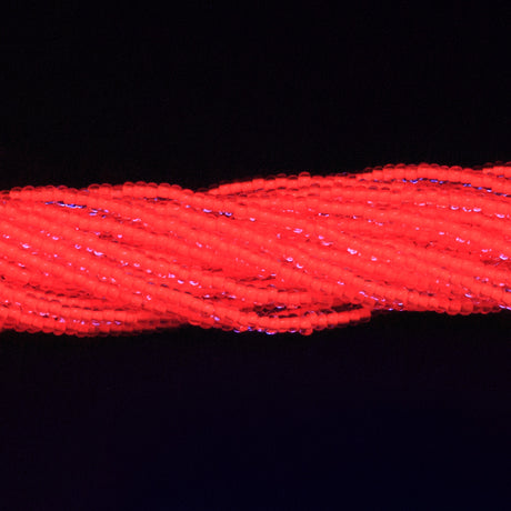 10SB734-N:  CZ Seed Bead Neon Lined Orange Uv Reactive 10/0 -  5HK