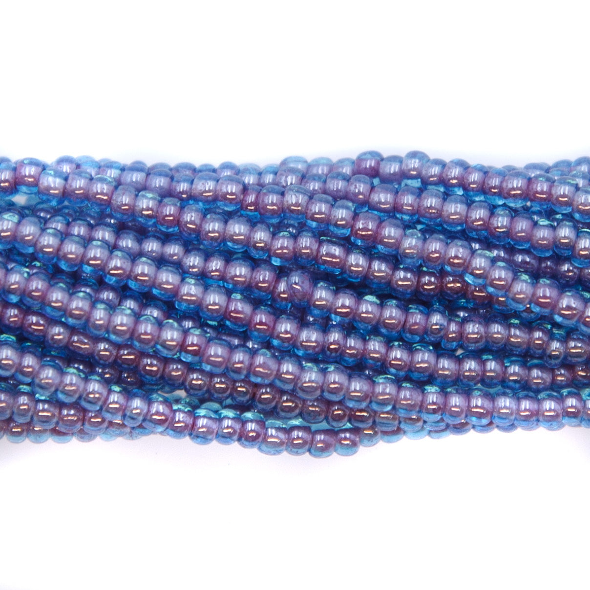 10SB764R: CZ Seed Bead Colorlined Magenta 10/0-1HK