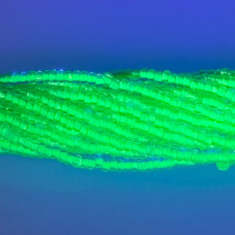 10SB784-NR: CZ Seed Bead Neon Lined Green 10/0 Uv Reactive - 1HK