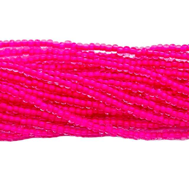 10SB793-N:  CZ Seed Bead Neon Lined Pink Uv Reactive 10/0 -  5HK