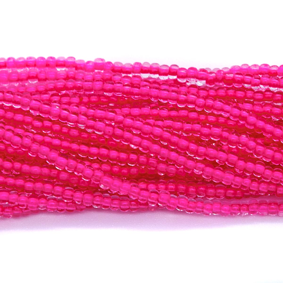 10SB793-NR: CZ Seed Bead Neon Lined Pink 10/0 Uv Reactive-1HK