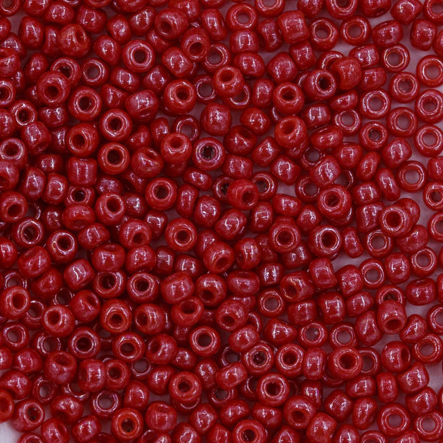 10SV347-1: Antique Venetian 10/0 Seed Bead Opaque Luster Red #1 - 10 Grams