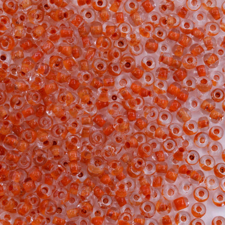 10SV734: Antique Venetian 10/0 Seed Bead Clear Orange - 10 Grams