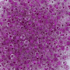10SV795: Antique Venetian 10/0 Seed Bead Color Lined Clear Thistle - 10 Grams