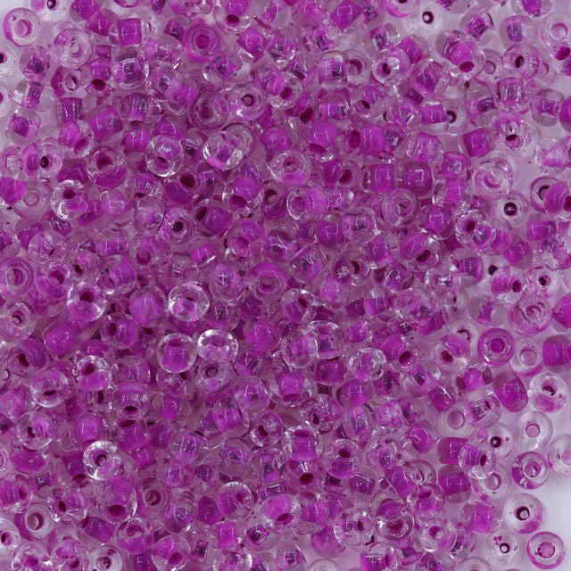 10SV795: Antique Venetian 10/0 Seed Bead Color Lined Clear Thistle - 10 Grams