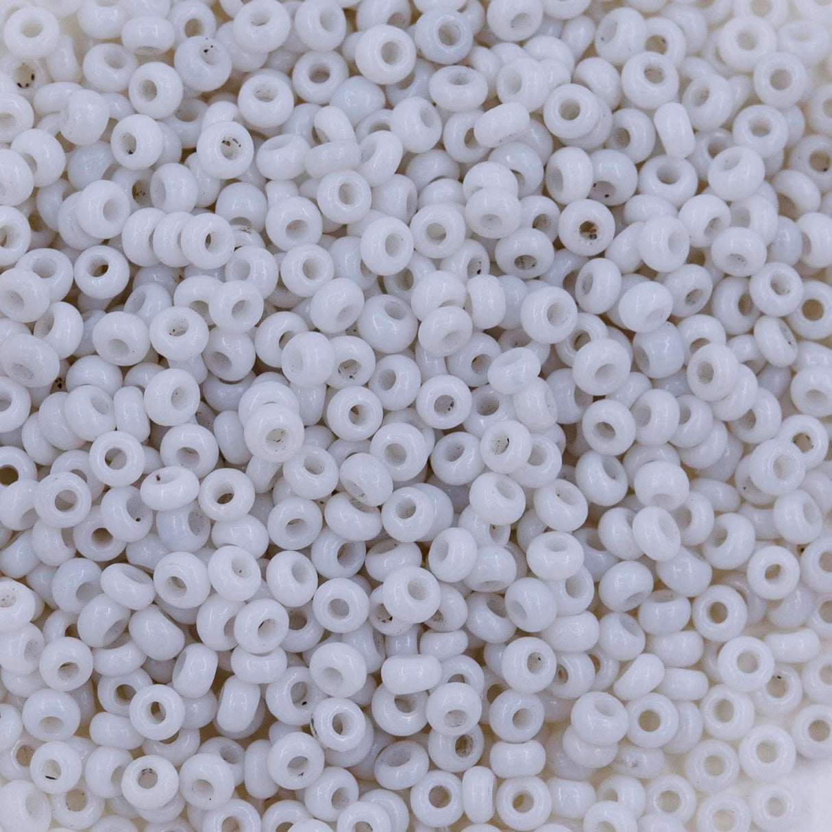 10SV8212-4: Antique Venetian 10/0 Seed Bead Opaline White #4 - 10 Grams