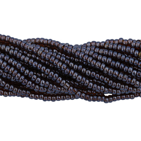 11SB356-TR: CZ Seed Bead Sfinx Trans Dark Topaz 11/0-1HK