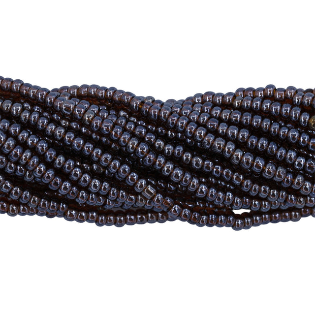 11SB356-TR: CZ Seed Bead Sfinx Trans Dark Topaz 11/0-1HK