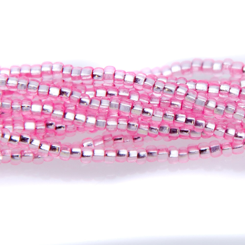 11SB491-DY: CZ Seed Bead Silver Lined Dyed LT Pink 11/0 6HK