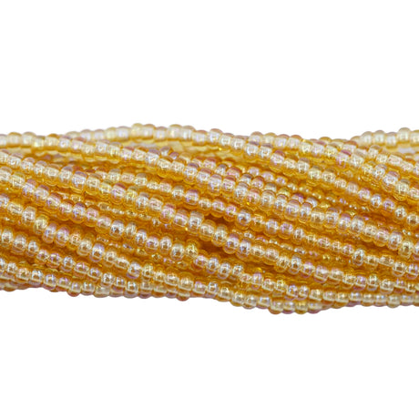 11SB552-TR: CZ Seed Bead TR Light Topaz AB 11/0 1 Hank