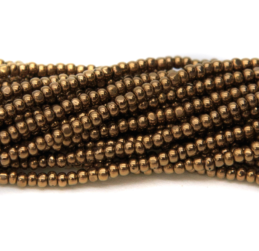 11SB555-C: CZ Seed Bead True Cut Bronze 11/0 6 Hanks
