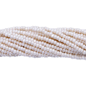 11SB652-CR: CZ Seed Bead True Cut Pearl Egg Shell 11/0-1HK