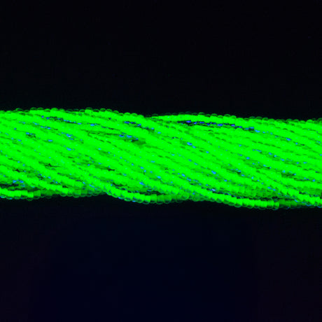 11SB784-NR: CZ Seed Bead Neon Lined Green 11/0 Uv Reactive-1HK