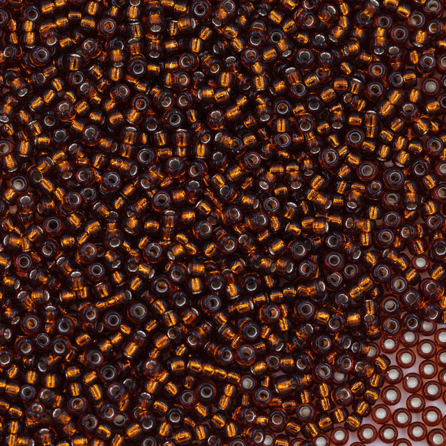 11SM456R: 11-0005R Miyuki Seed Bead 11/0 Dk Topaz Silver Lined - 25GM