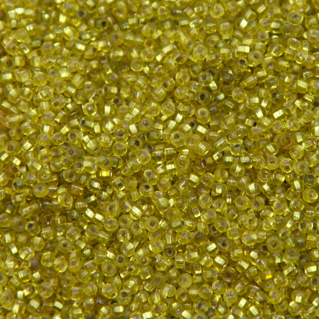 11SV426-Q: Vintage Venetian S/L Green Yellow #3 SQ Hole 11/0 500 Grams