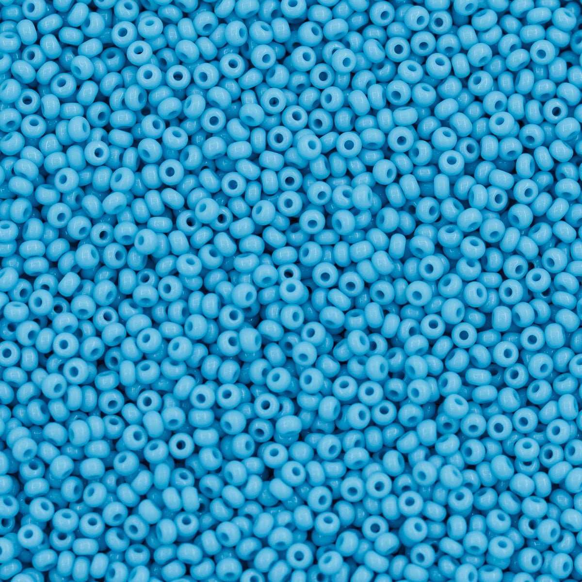 12SB164-L: CZ Seed Bead Turquoise Blue 12/0 Loose