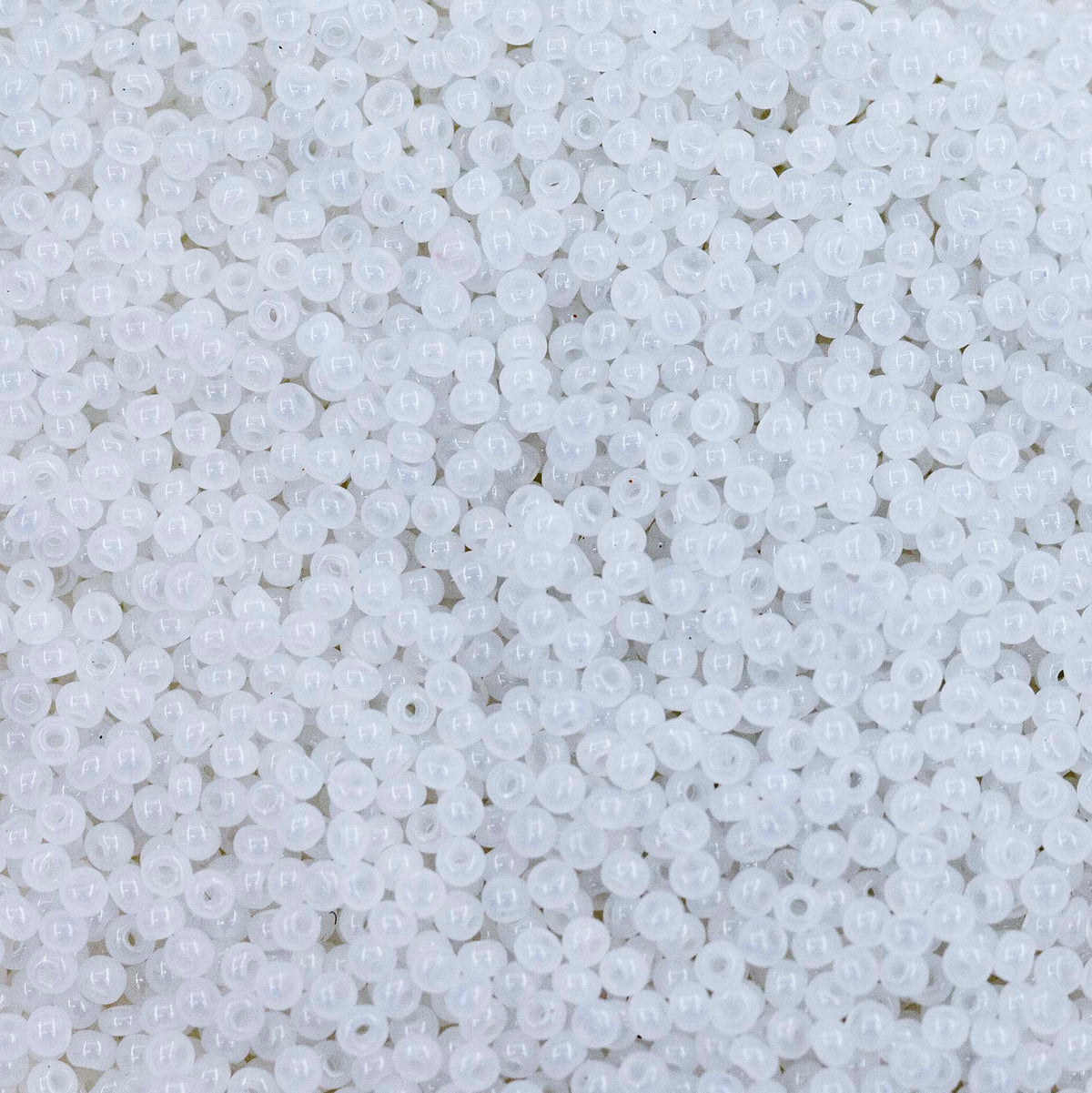 12SB210-L: CZ Seed Bead White Opal 12/0 Loose