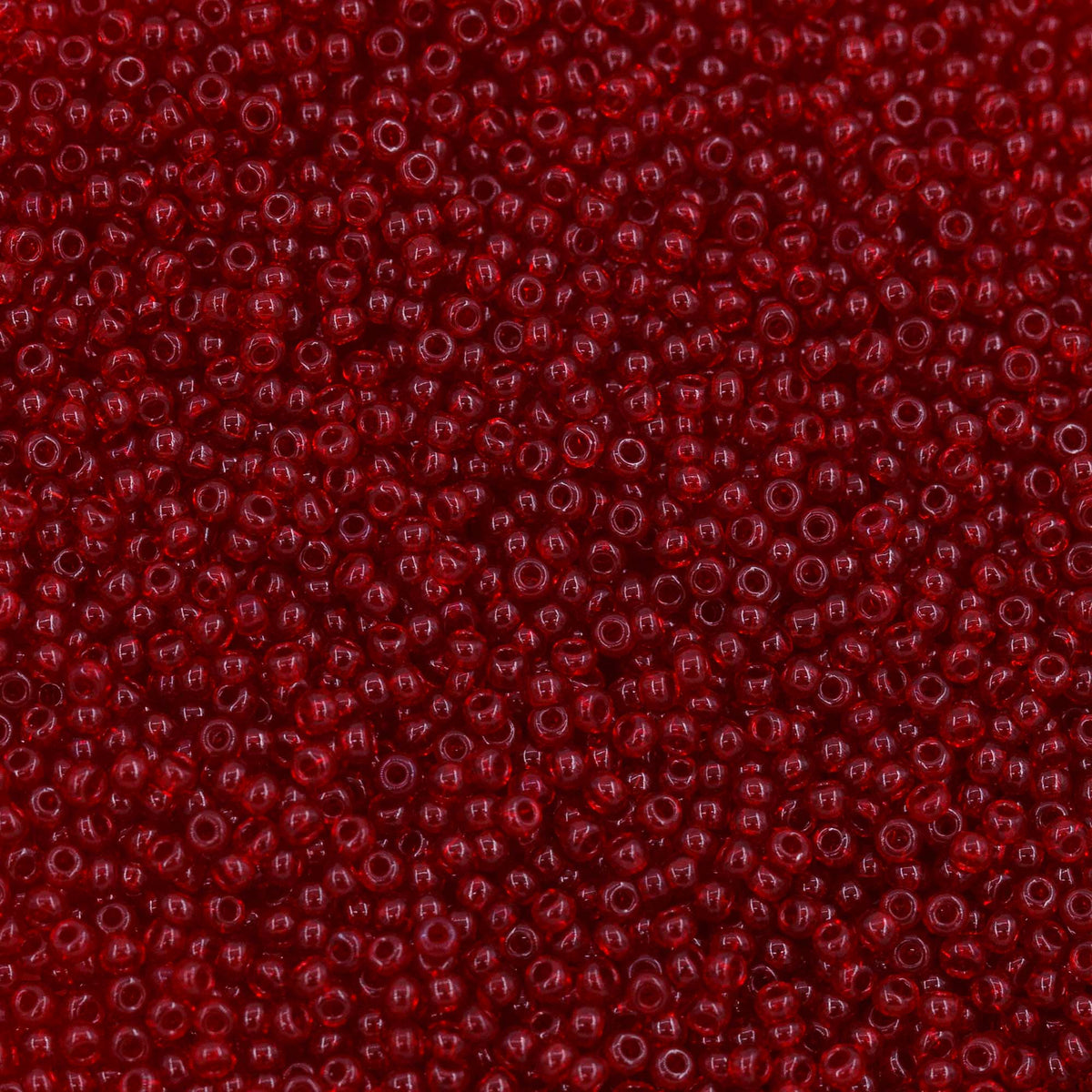 12SB244-L: CZ Seed Bead Ruby 12/0 Loose