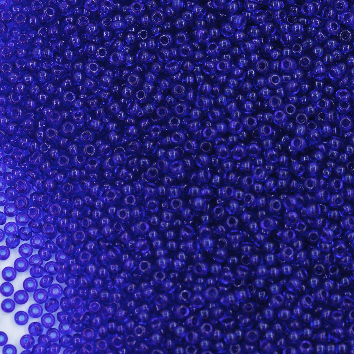 12SB268-L: CZ Seed Bead Capri Blue 12/0 Loose