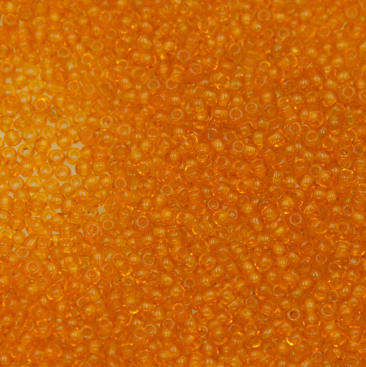 12SV100-43: Vintage Venetian Seed Bead Tr Burnt Orange 12/0