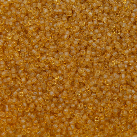 12SV253-7QR: Vin Venetian Seed Bead Trans Gold #7 SQ-HOLE 12/0-50GMs