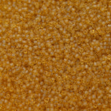 12SV253-7R: Vin Venetian Seed Bead Trans Gold #7 SQ-HOLE 12/0-50GMs