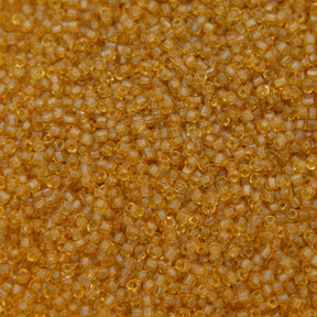 12SV253-7R: Vin Venetian Seed Bead Trans Gold #7 SQ-HOLE 12/0-50GMs